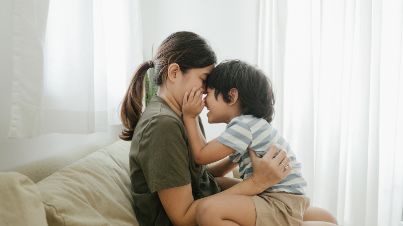 Child expressing affection for his mother