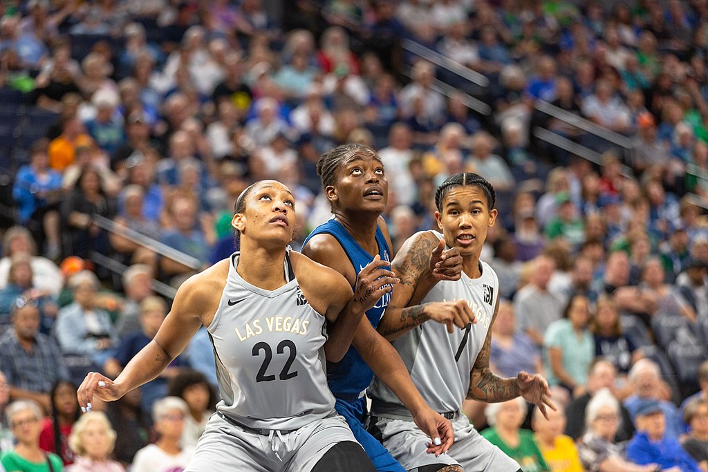 Temi Fagbenle (14) looks for a rebound and is guarded by A'ja Wilson (22) and Tamara Young (1) in the Lynx vs Aces game at Target Center, 13 July 2018