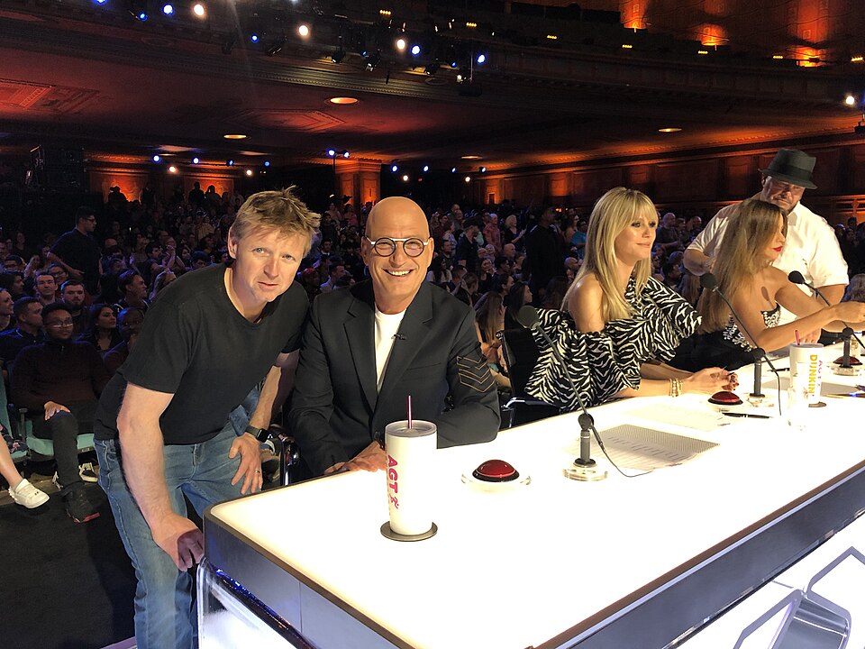 Howie Mandel and technology executive Trevor Doerksen pose on set of America's Talent days before COVID-19 shut down TV production across Los Angeles, California, 5 March 2020